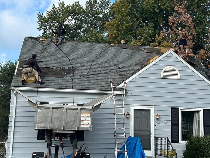 Quick-Roof-Replacement-Near-Me-700x525-1 Home Roof Being Replaced