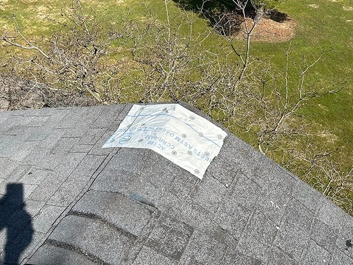 Roof-Leak-Repair-Near-Me-700x525-1 Roofing Specialists Working on a Roof