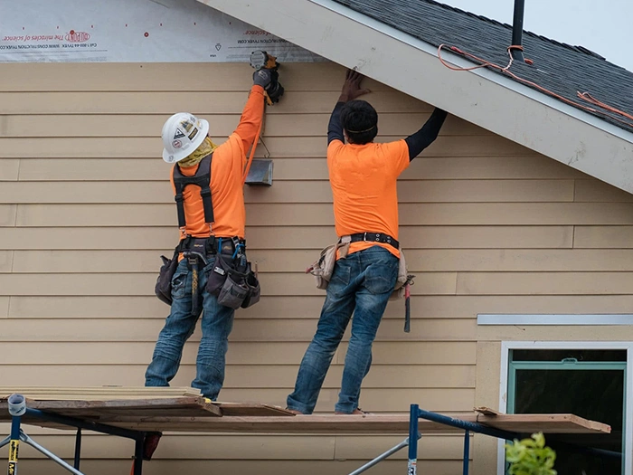 Wood-Siding-Replacement-in-Bay-Village-700x525-3 Workers Installing Home Siding